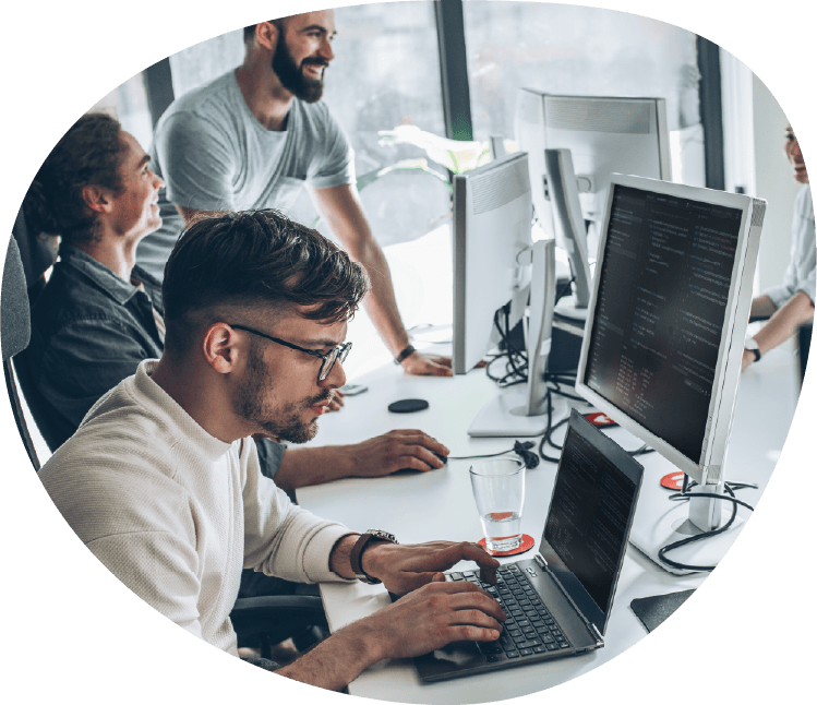 people and laptop screens