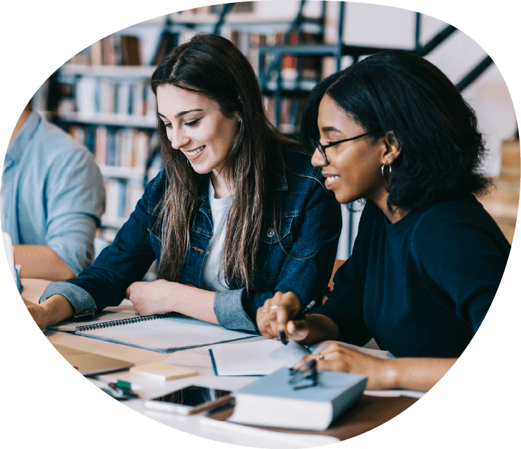 two girls looking at tablet