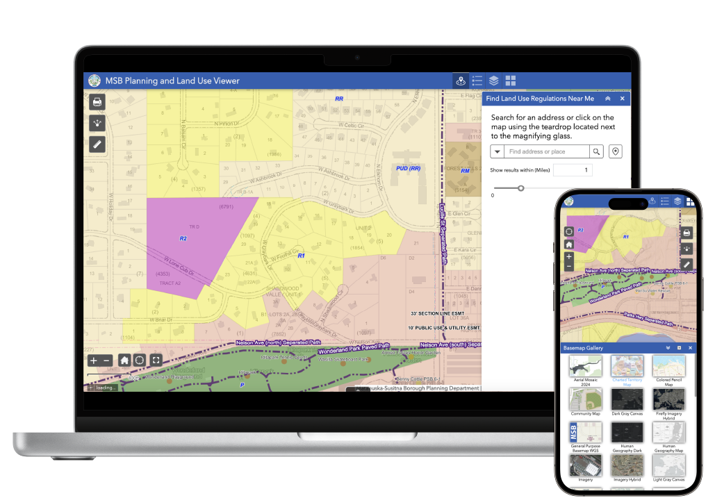 Laptop and phone displaying the planning and land use viewer with address look up.
